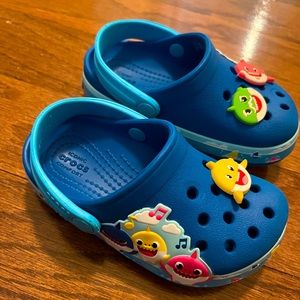 Slightly Worn Baby Shark Crocs with charms